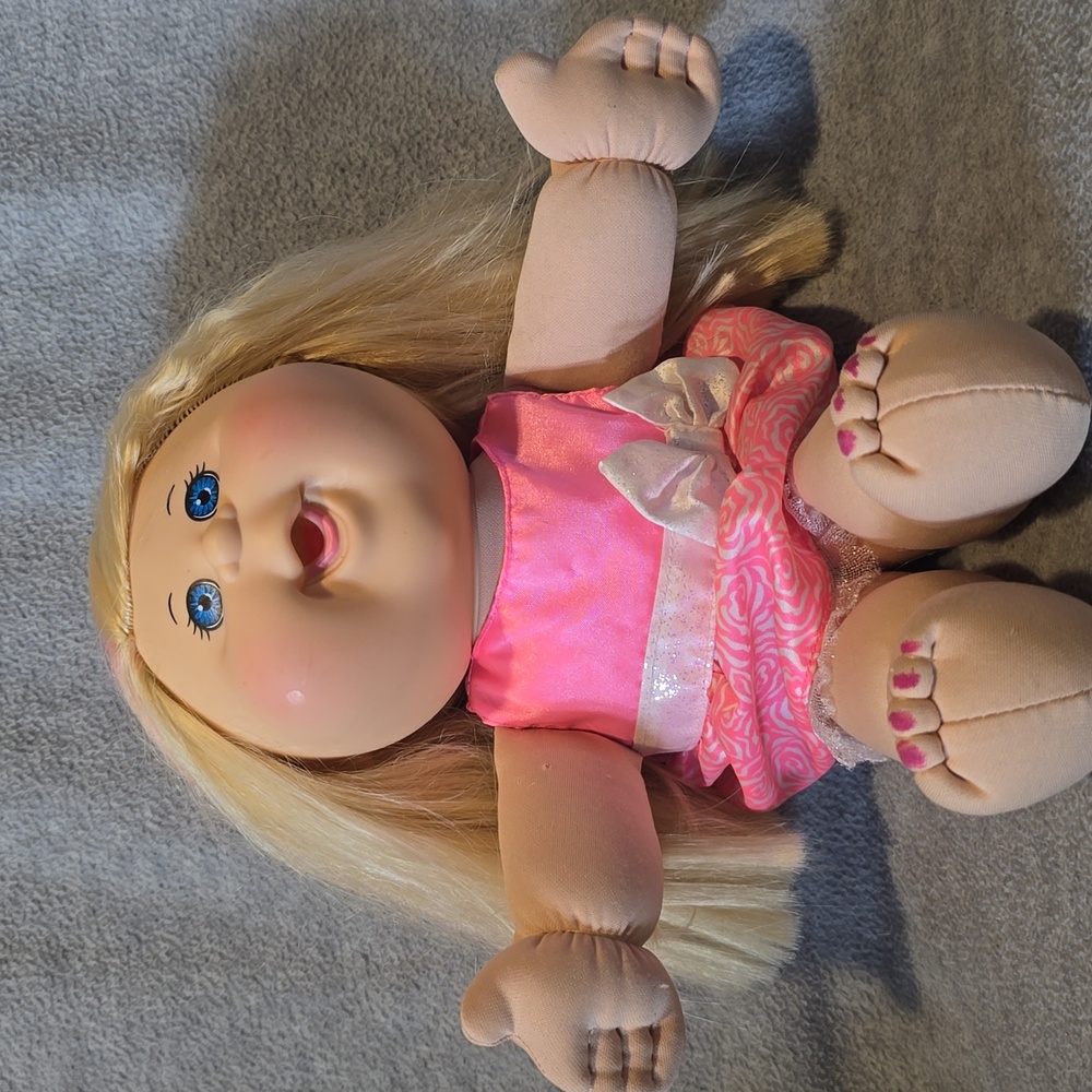 Blonde Doll in Pink Dress with Bow